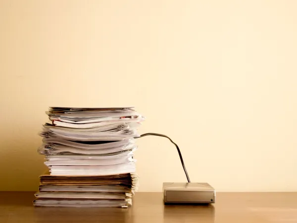 Transaction Cost Economics and the Shift to Paperless Business in 2025